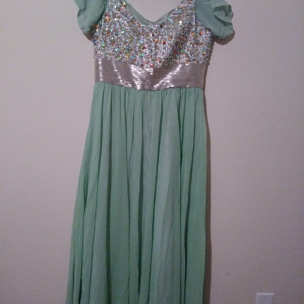 A dress formal very clean light green color